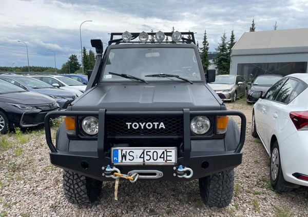 Toyota Land Cruiser cena 69900 przebieg: 363433, rok produkcji 1987 z Olsztyn małe 211